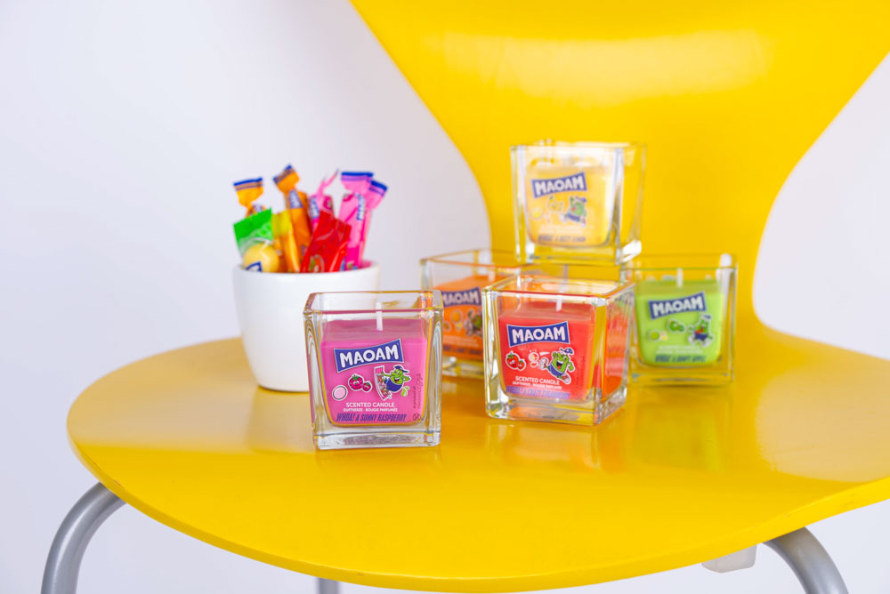 Maoam scented candle jars with various scents and designs